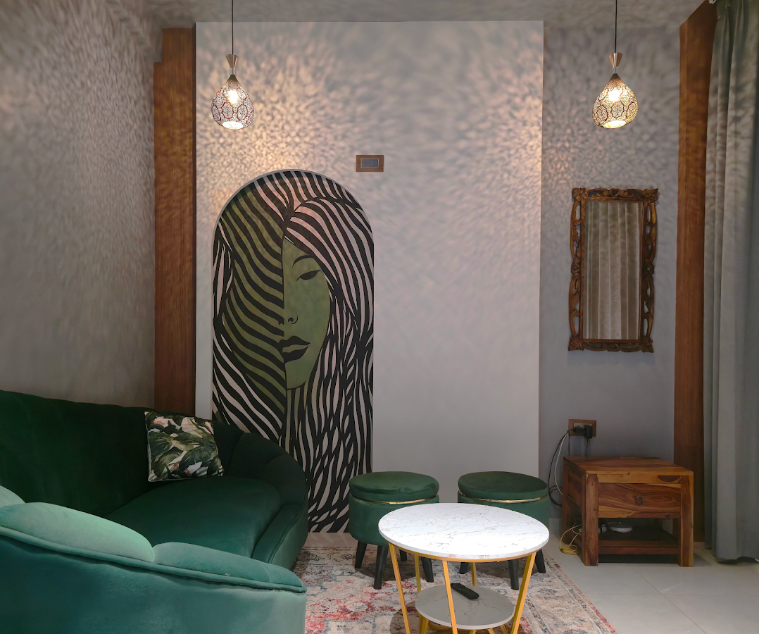 Executed living room interior with a green sofa, mural feature wall and warm timber details