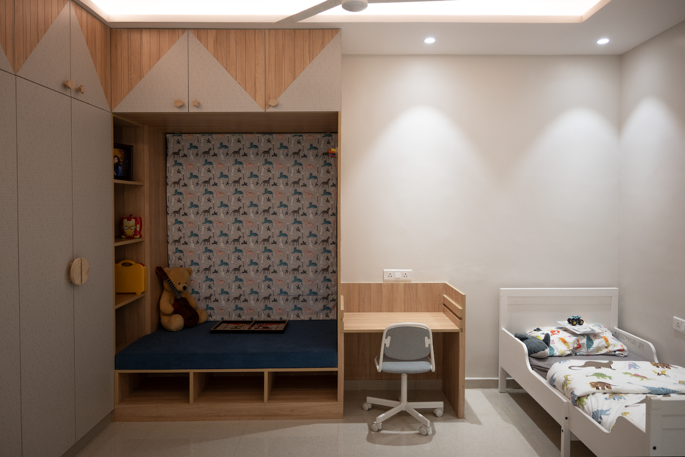 Executed children’s room with integrated storage, study desk and reading nook